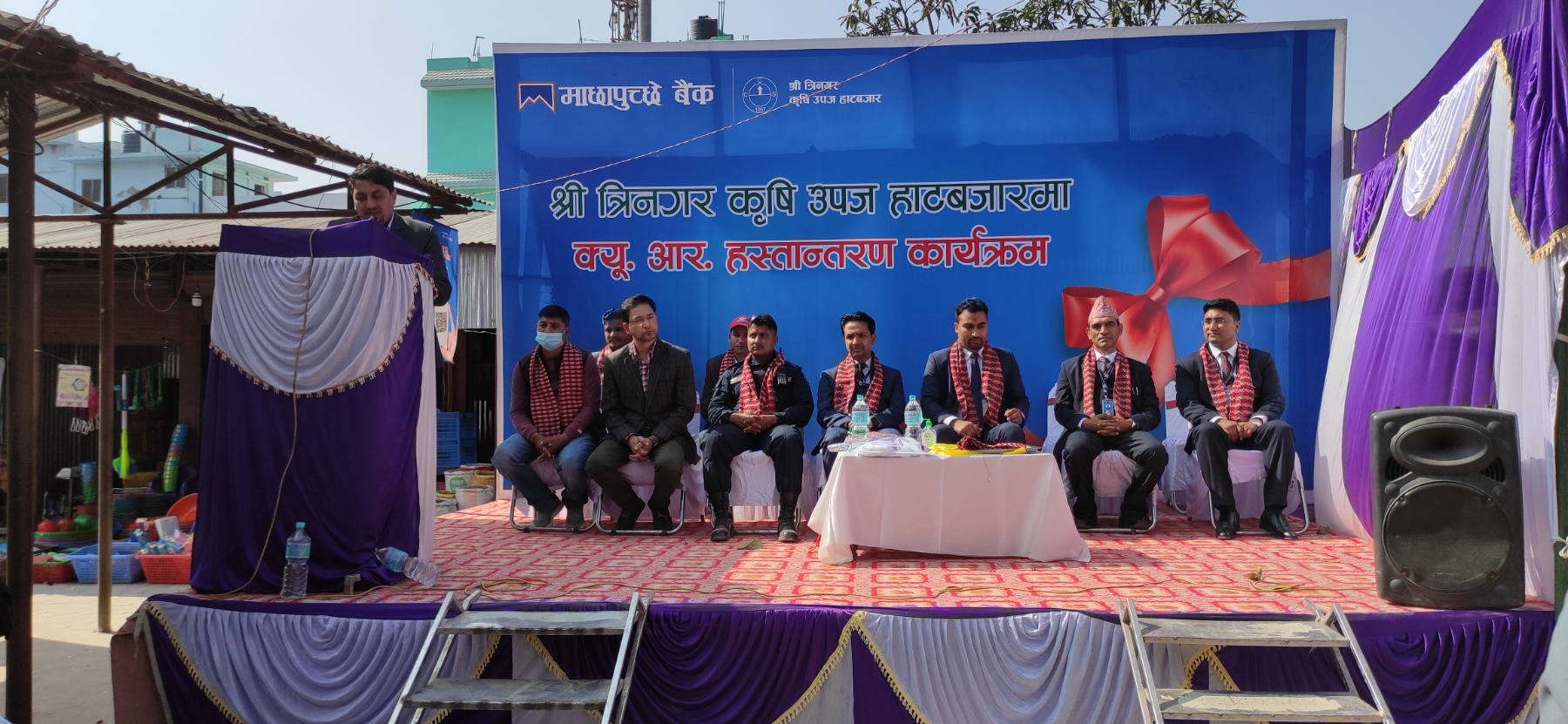 Machhapuchhre Bank’s QR code service in Trinagar Agricultural Market, Dhangadhi