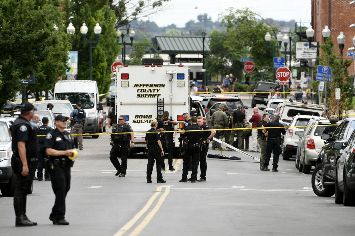 Three killed in Denver-area shooting, including officer, suspect