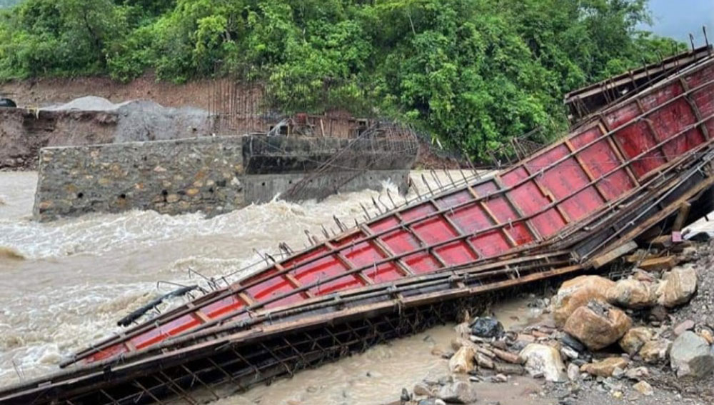 The flood washed away the bridge under construction, the slope was being prepared today