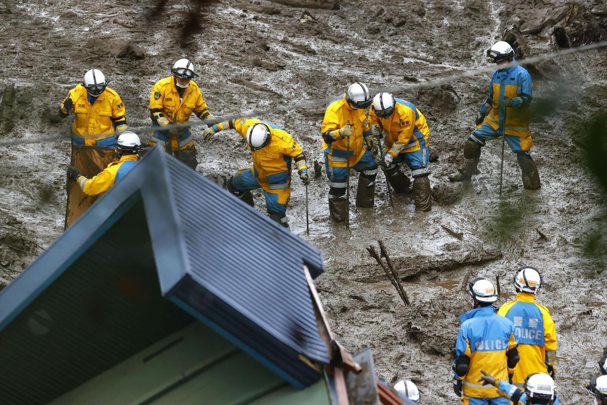 Japan searches for 24 unaccounted for in mudslide; 4 dead