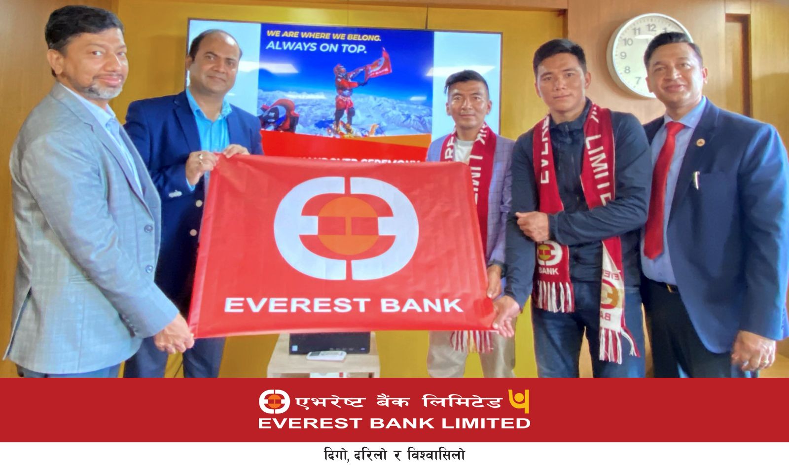 Everest Bank’s flag on the summit of Mount Everest