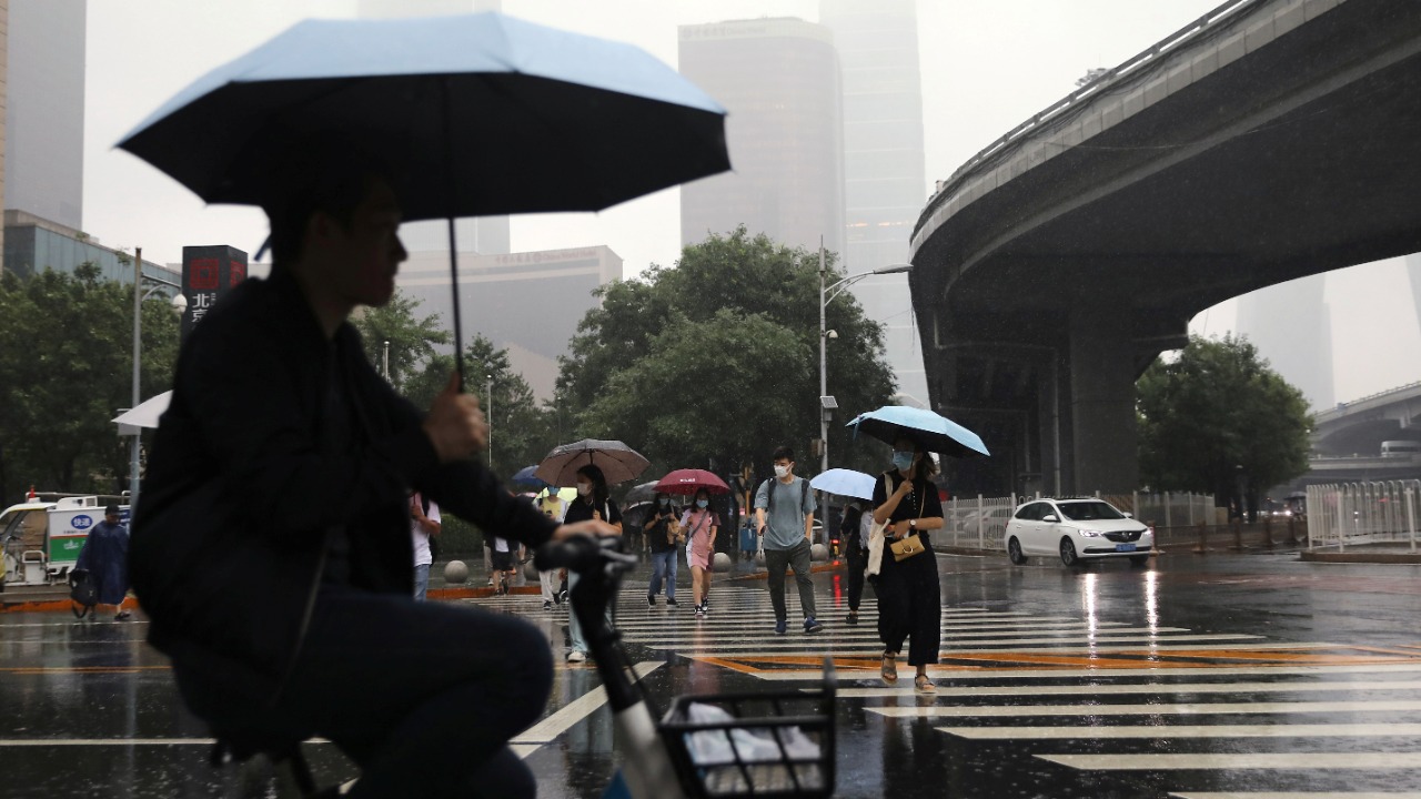 Flights canceled and schools closed as Beijing hit by storm