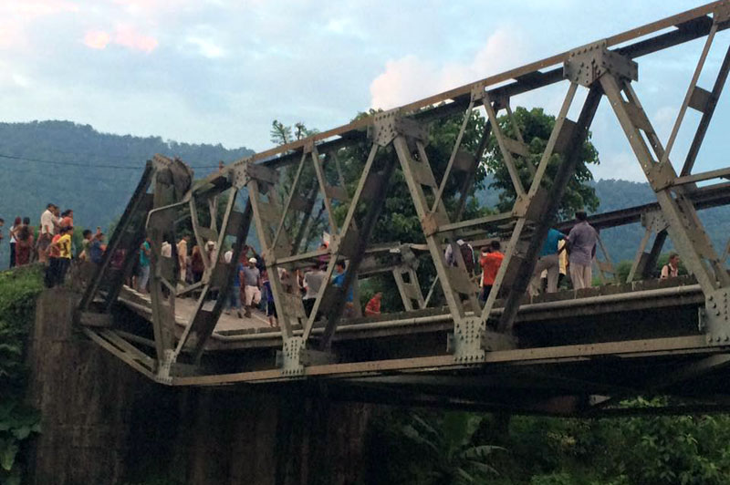 Transportation halts after bridge subsides