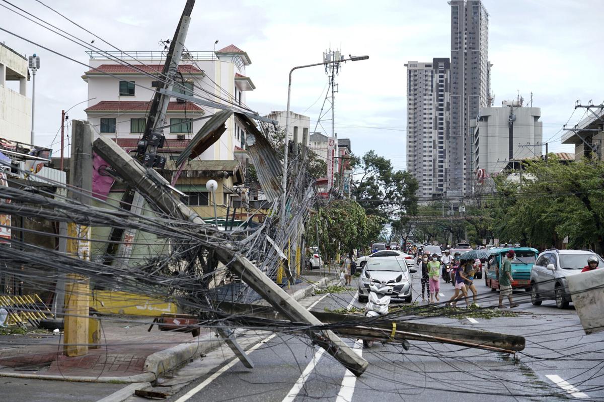 Death toll from Super Typhoon Rai climbs to at least 208 in the Philippines