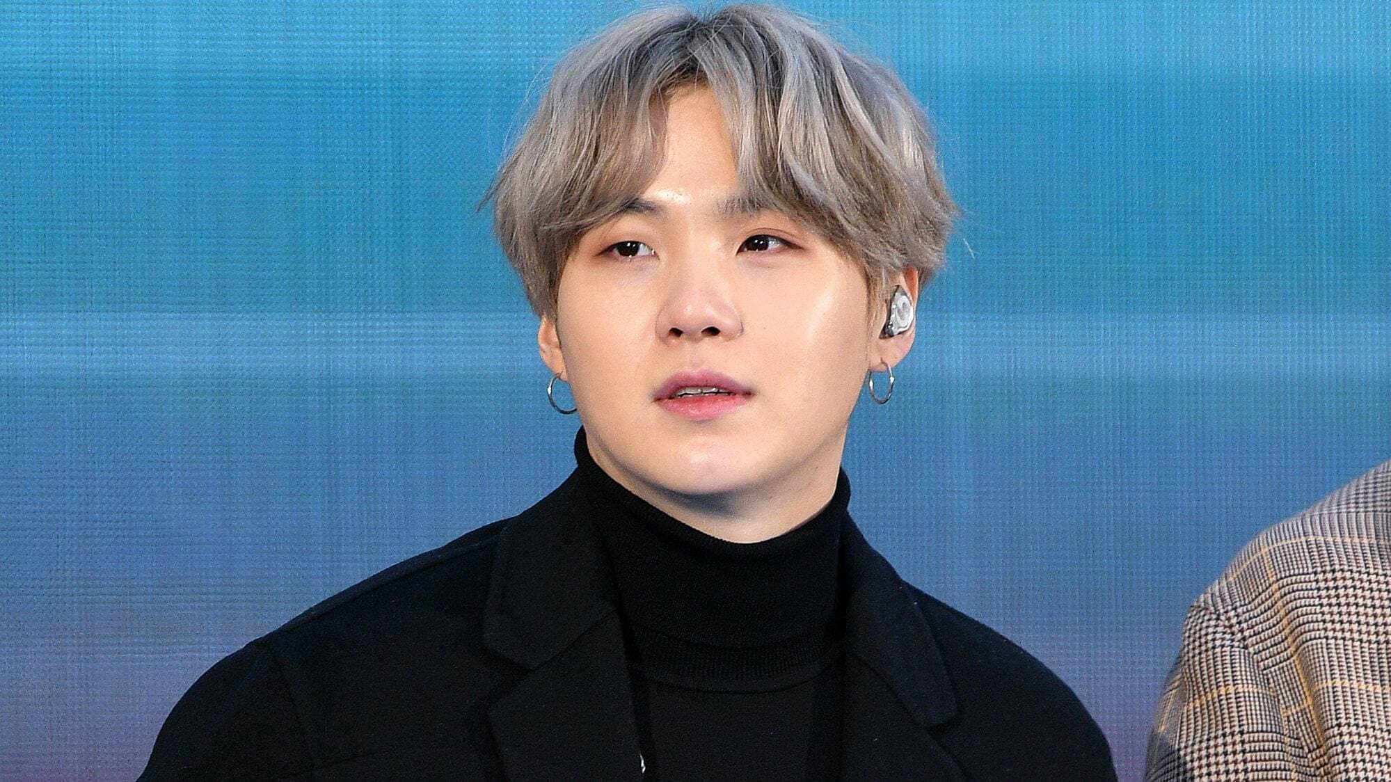 K-pop star Suga tests positive for COVID-19 after BTS return from U.S