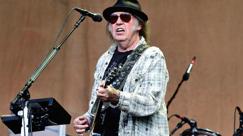 Spotify removes Neil Young after he calls for Joe Rogan to go