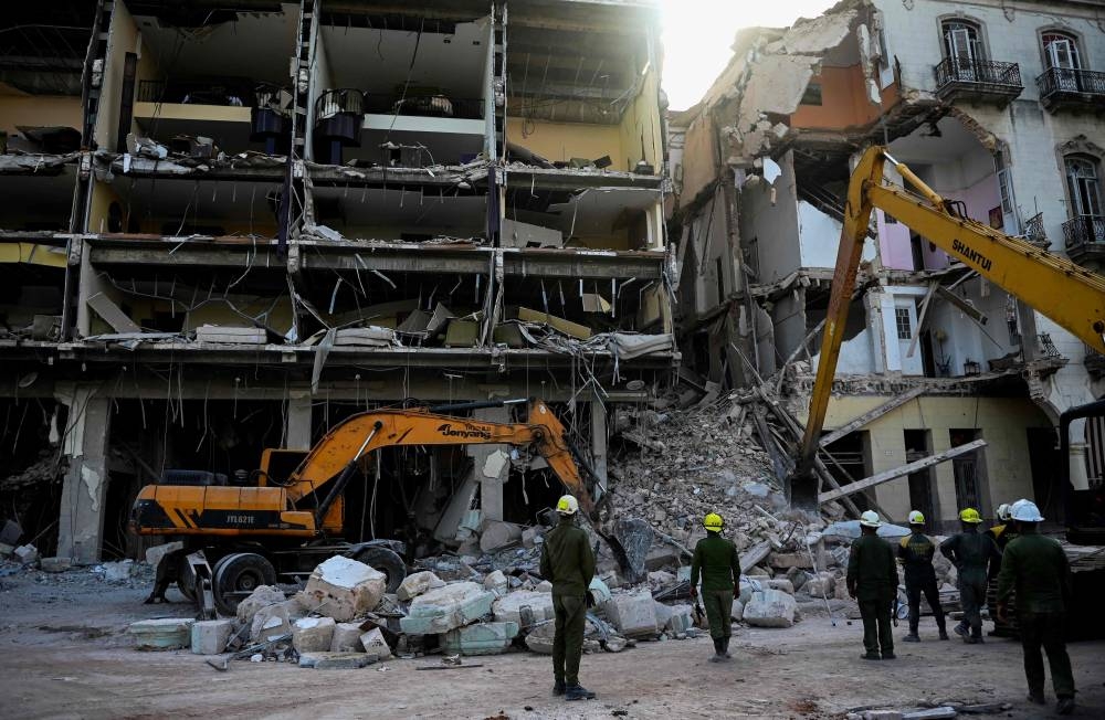 Rescuers Comb Through Havana Hotel Blast Rubble, Death Toll Climbs To ...