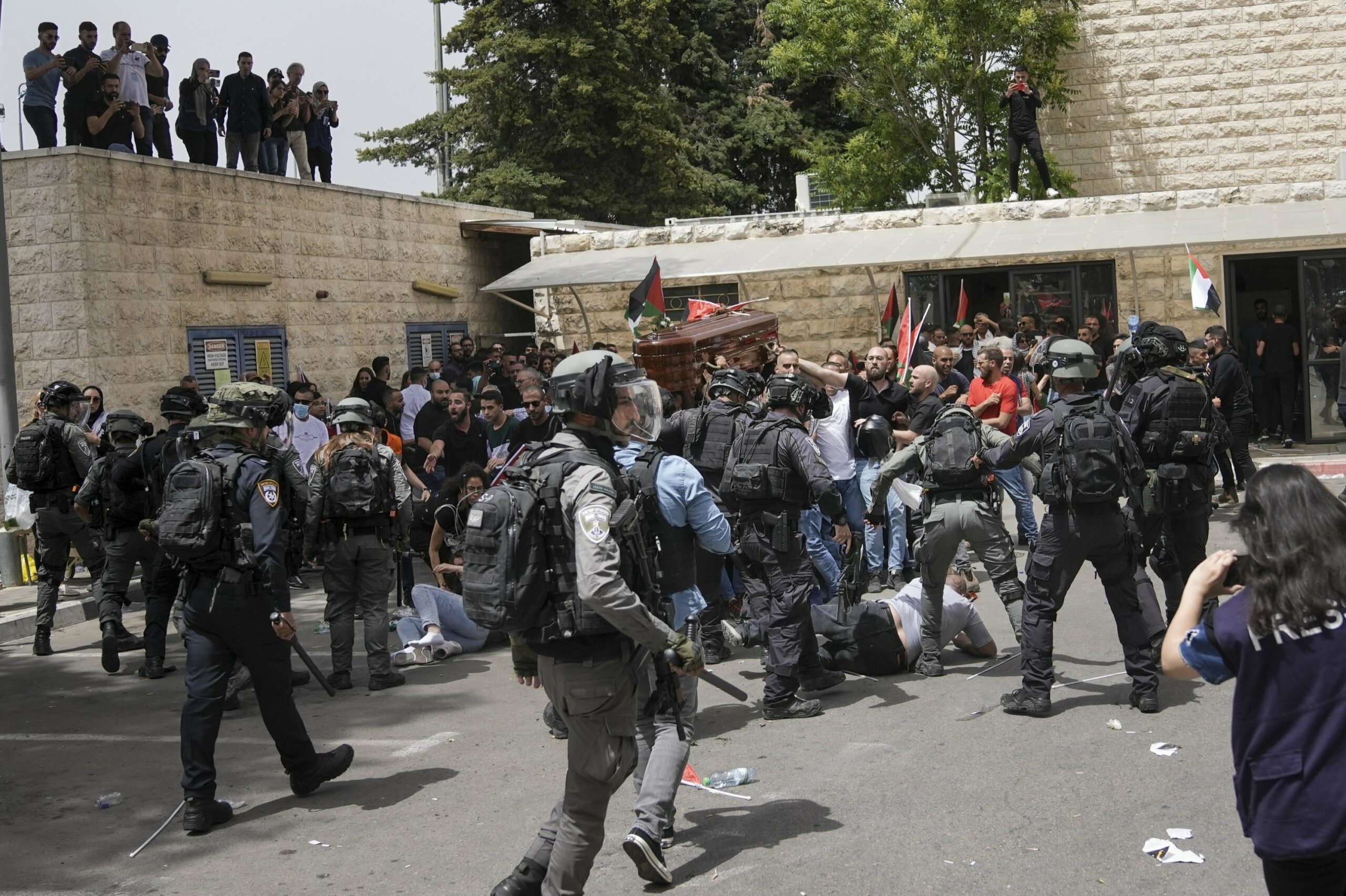 Israeli police beat pallbearers at Al Jazeera journalist’s funeral