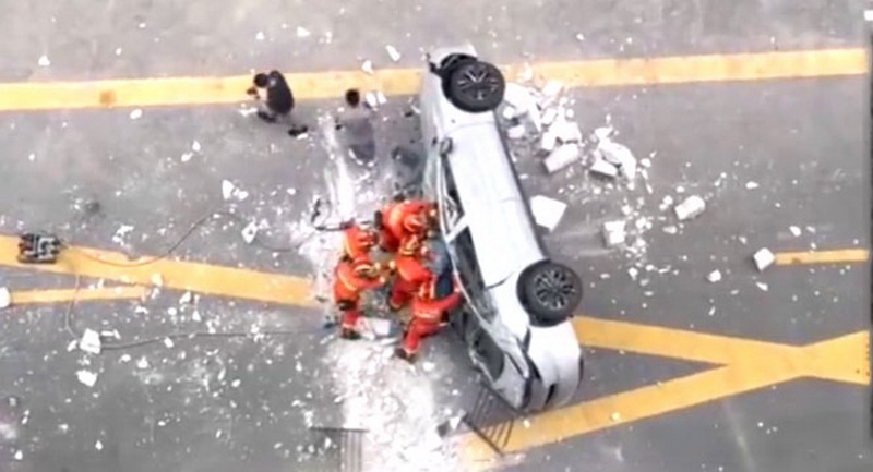 Two killed as Nio electric car falls from third floor office in Shanghai