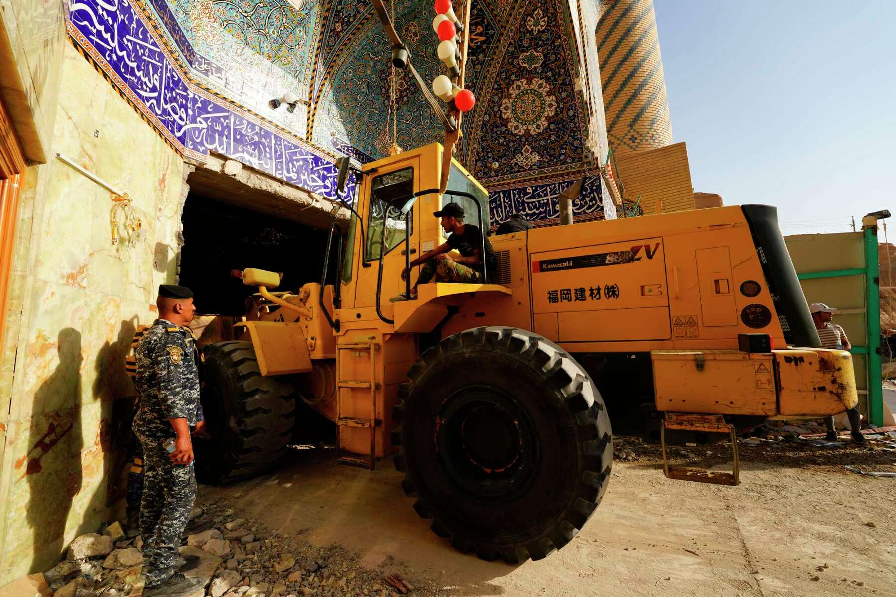 Two more bodies pulled from Iraq shrine after landslide: rescuers