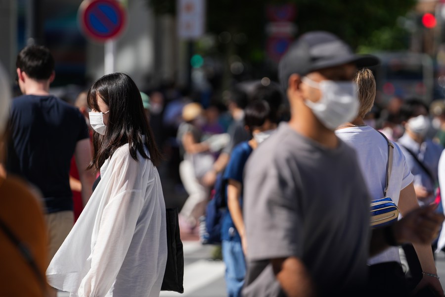 Japan’s daily COVID-19 cases hit record high of 250,403