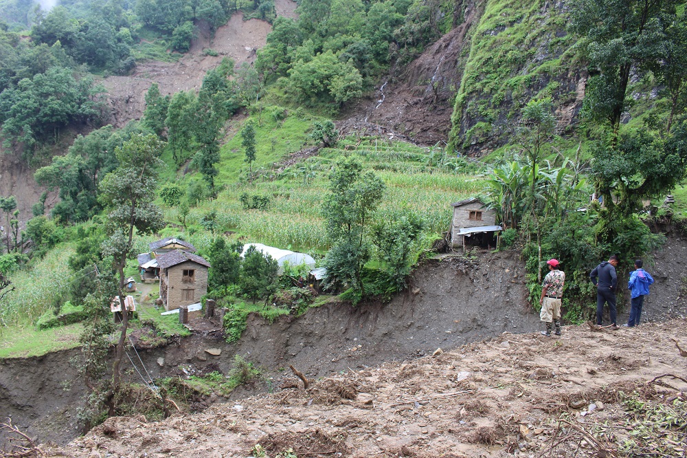 Landslide killed two people and left three others missing