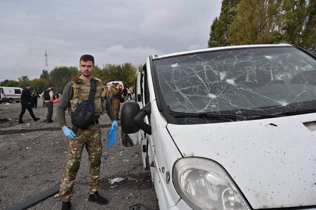 Ukraine says Russian strikes on civilian convoy kill 23