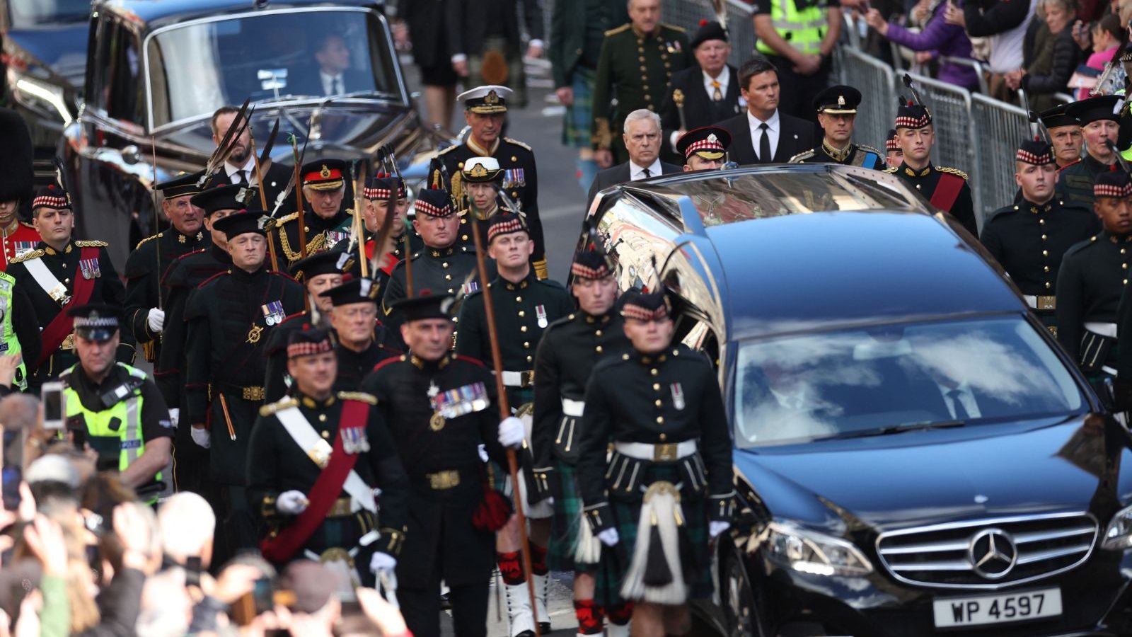 King Charles leads procession behind queen’s coffin in Edinburgh