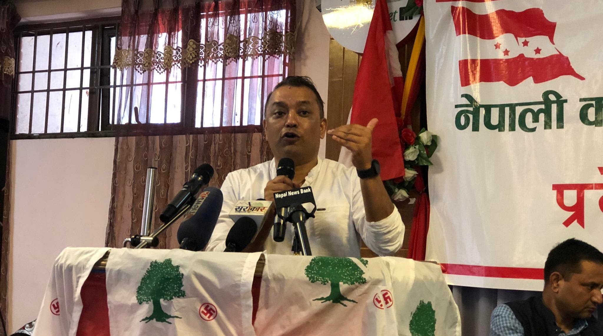 Gagan Thapa holding a press conference