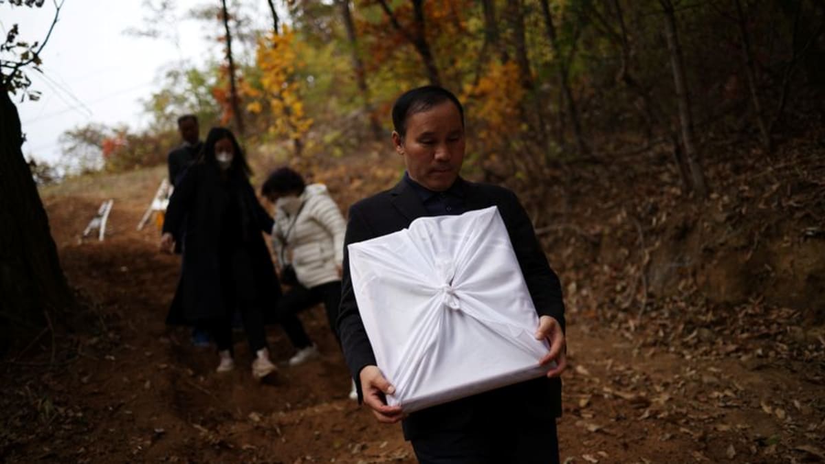 South Korean parents bury children killed in Halloween disaster
