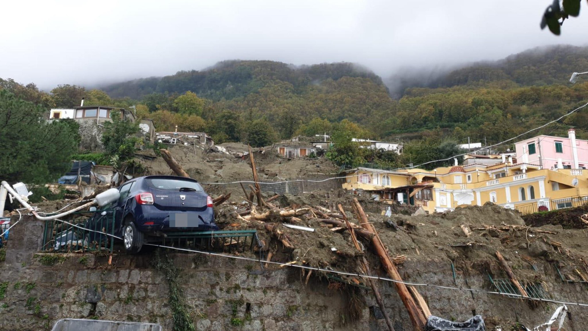 Italy landslide: Five bodies found as rescue work continues