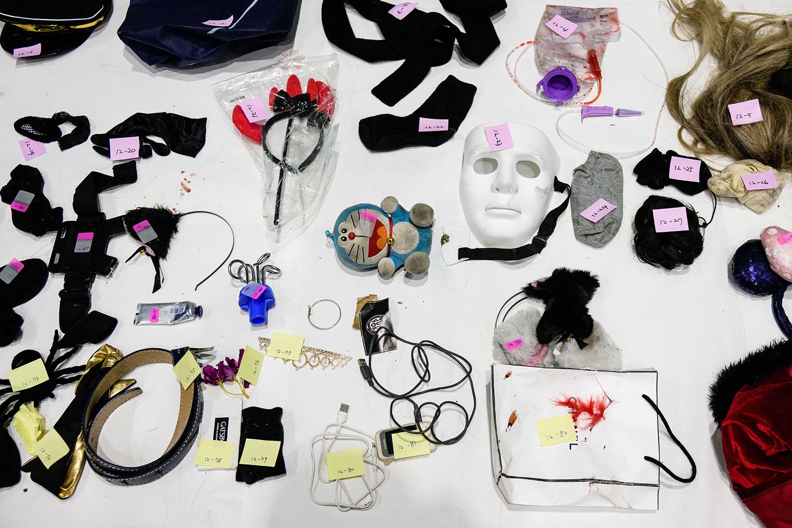 Families of Halloween crush victims identify lost items as South Korean police admit mistakes