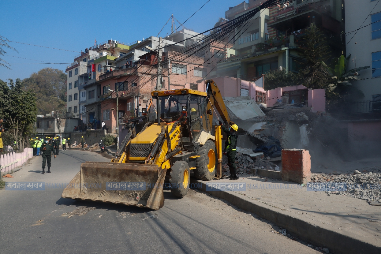 In Pics: KMC dozer demolishing illegal structure Dhobi Khola coastal settlement