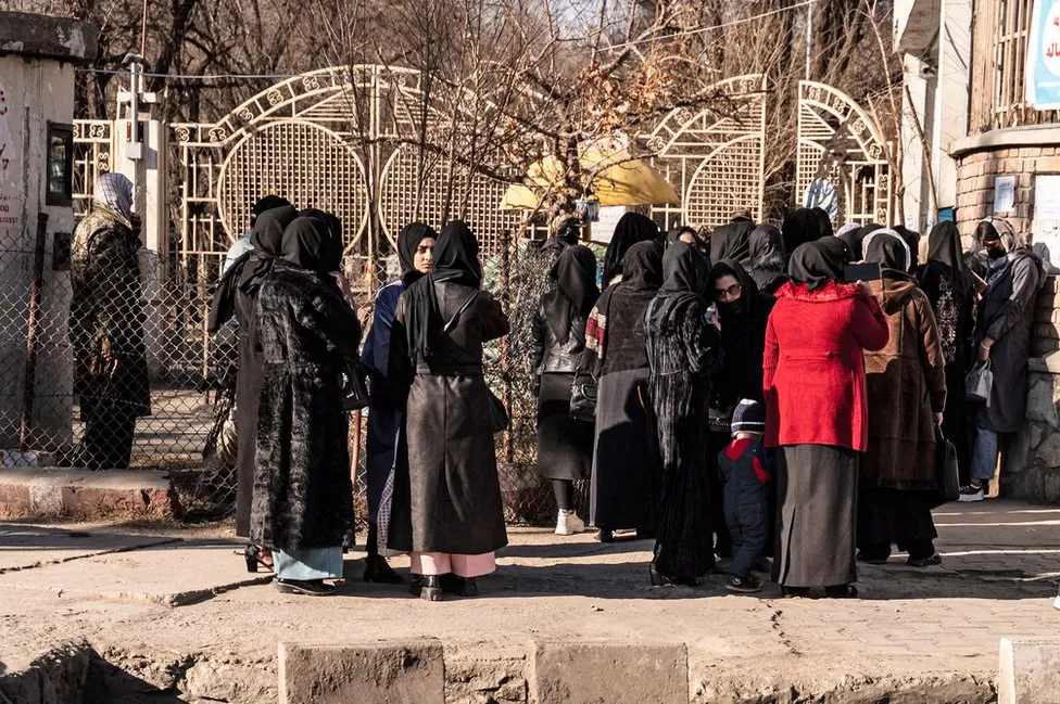 Afghanistan: Tears and protests as Taliban shut universities to women
