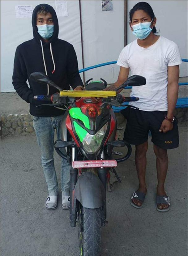 2 arrested with stolen motorcycle
