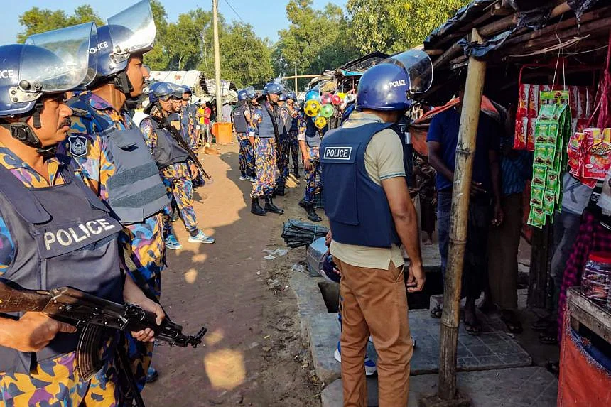 Myanmar police arrest trafficking gang linked to deaths of 13 Rohingya