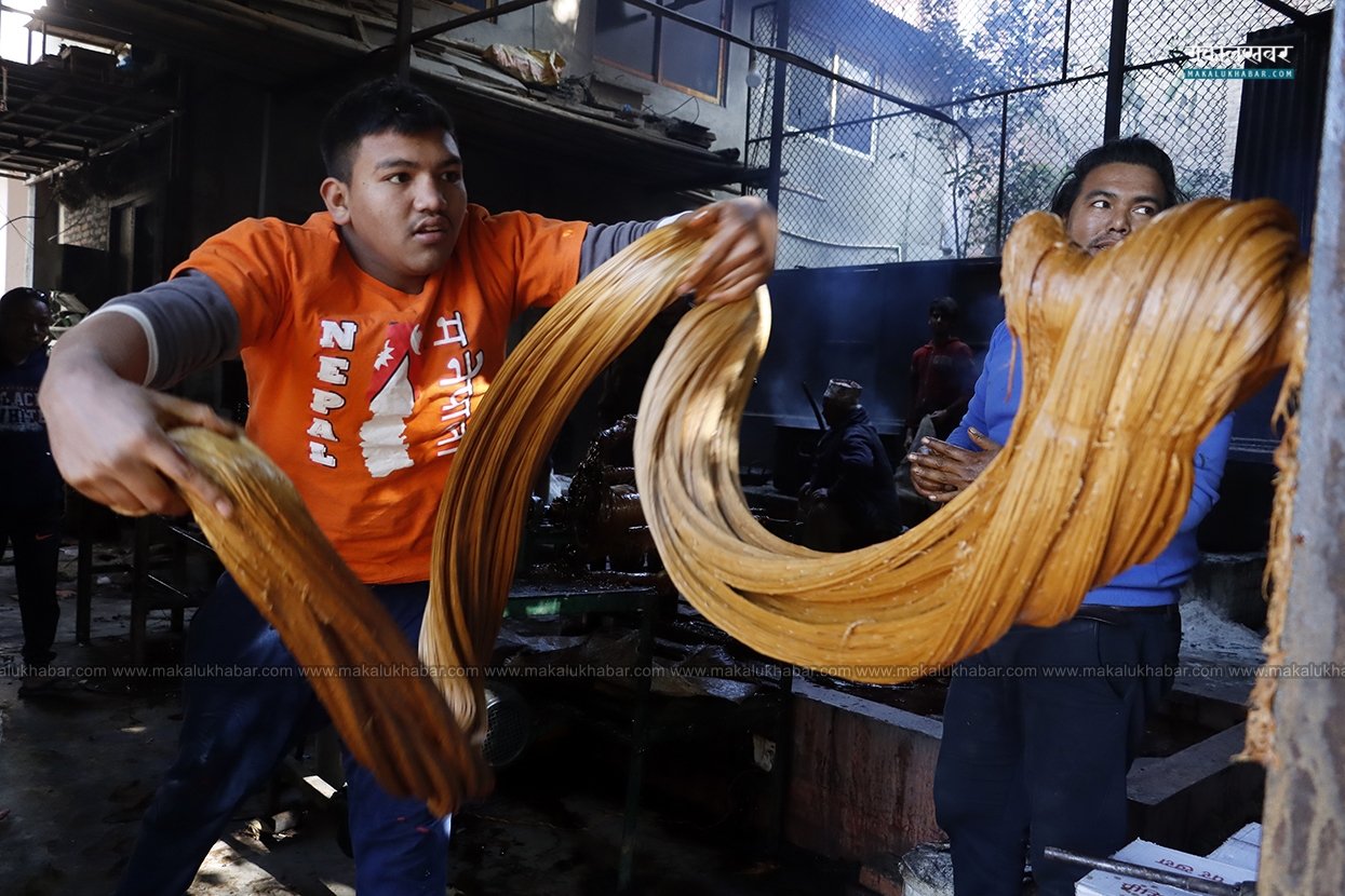 In Pics: Tokha businessman busy in making Chaku as Maghe Sankranti approaches