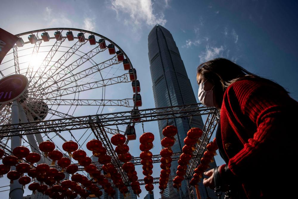 China to fully reopen borders with Hong Kong, Macau