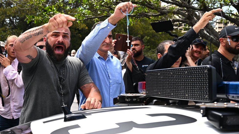 Cardinal George Pell’s funeral sees mourners and protesters clash