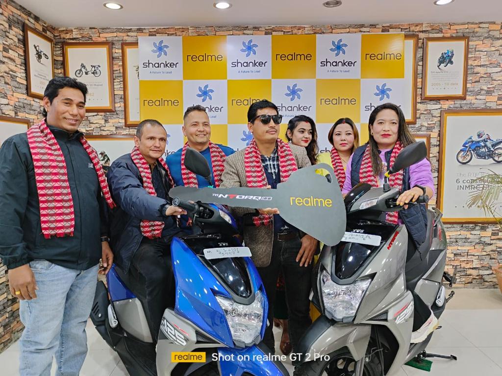 realme distributes 21 TVS Ntorq scooters to achievers