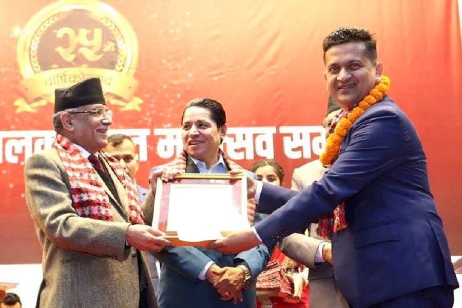 Rajan Kafle honored with ‘Outstanding Youth Photojournalism Award’