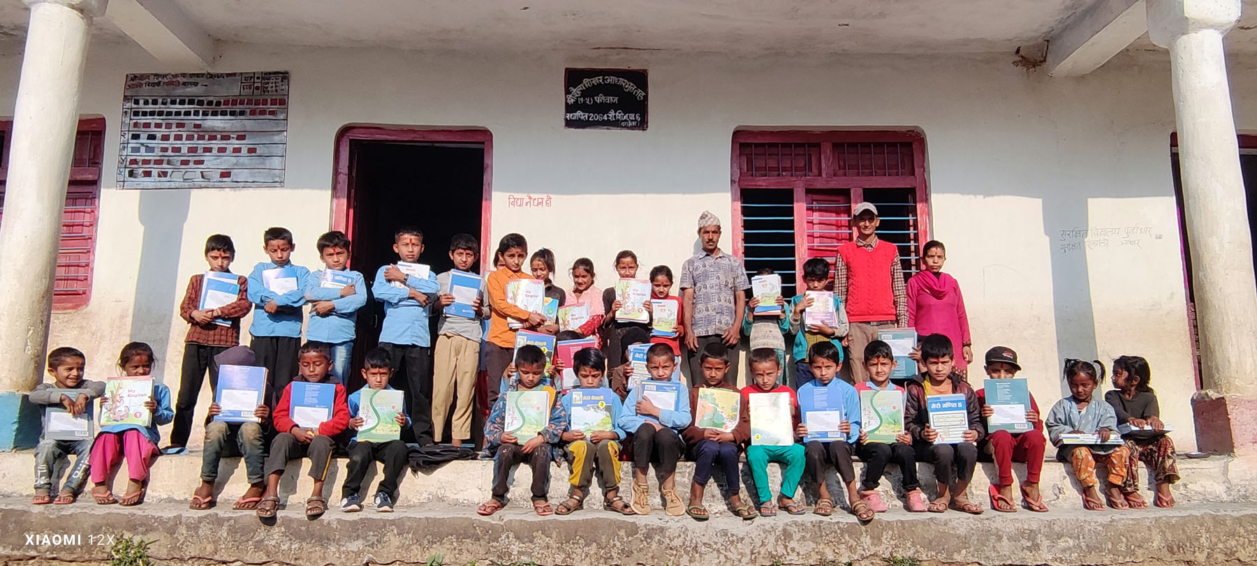 Students getting textbooks along with their enrollment in Darchula this year