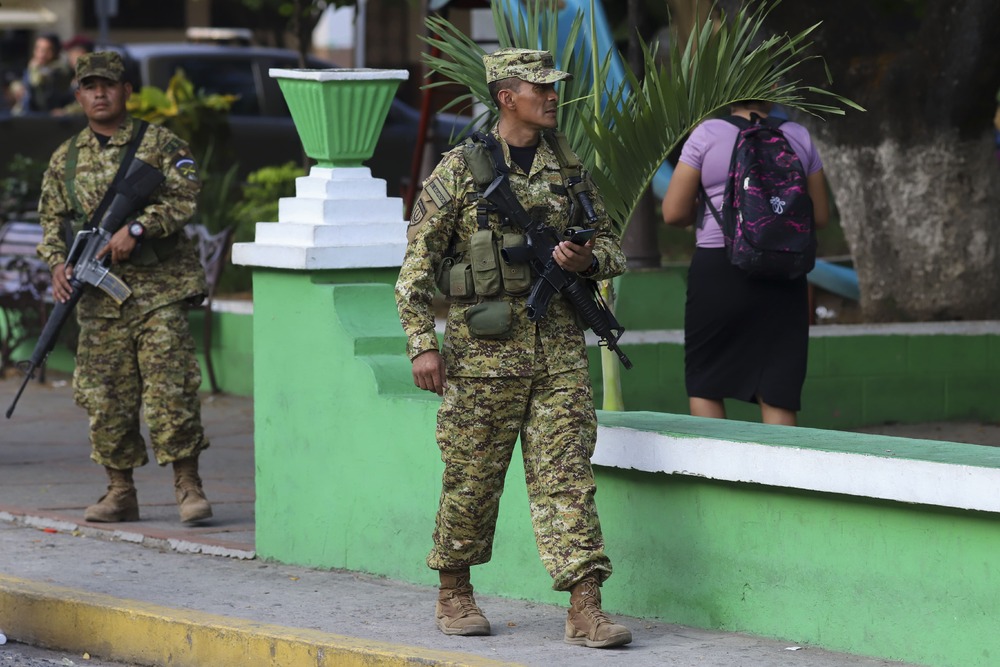 Three arrested in El Salvador police officer’s killing after siege