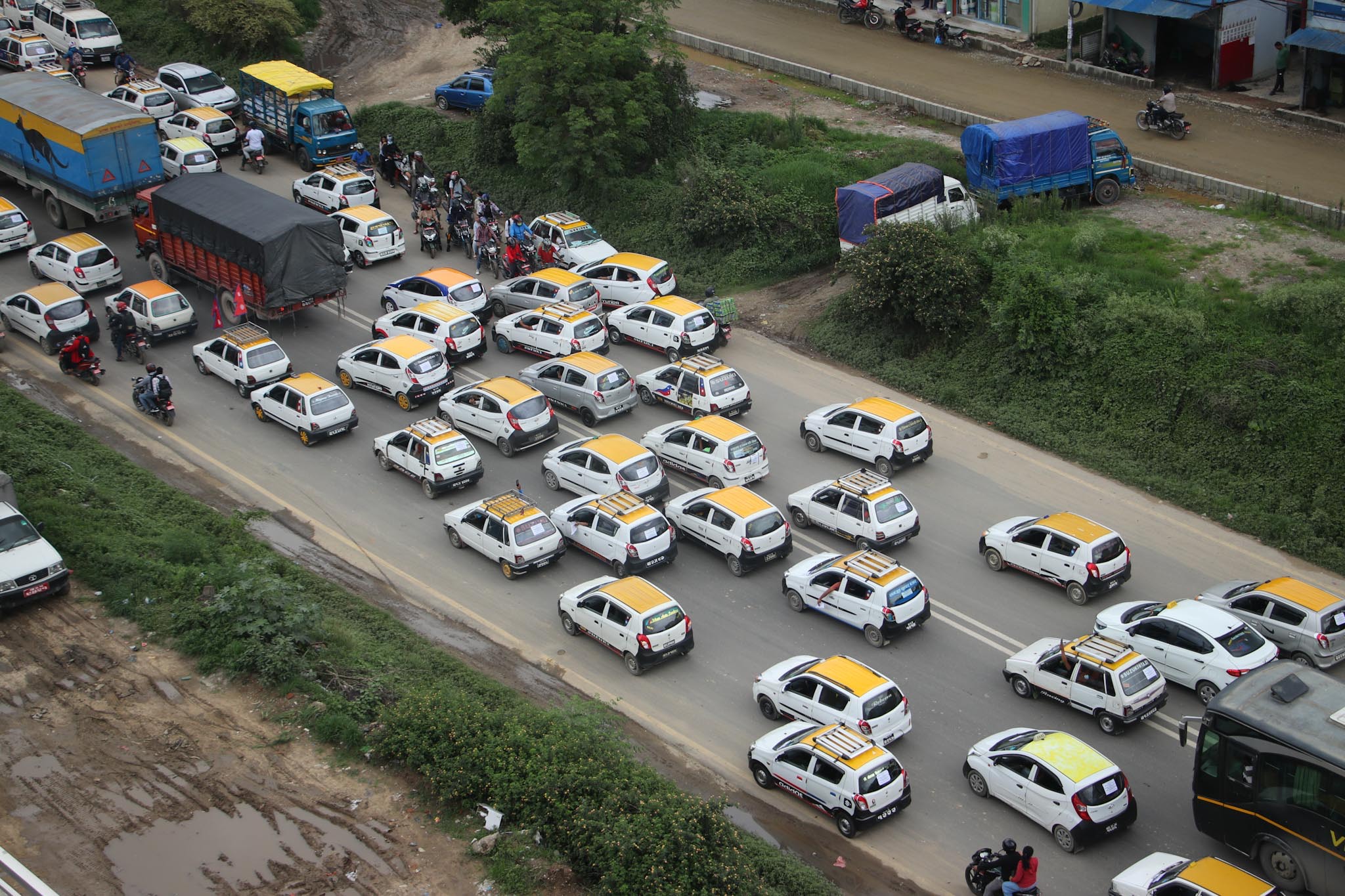 In Pics: Transport business associates on road protest