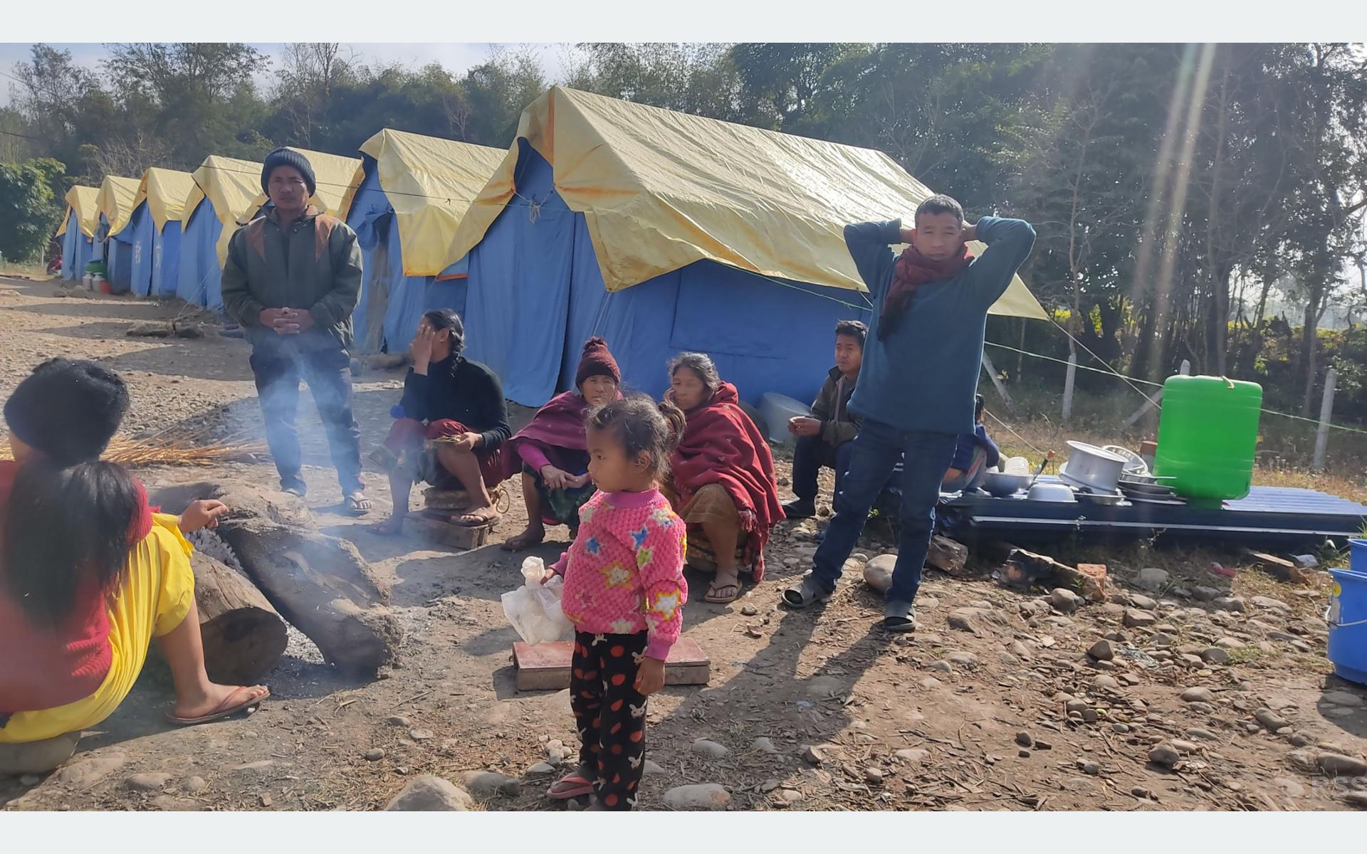 Displaced families living under open sky