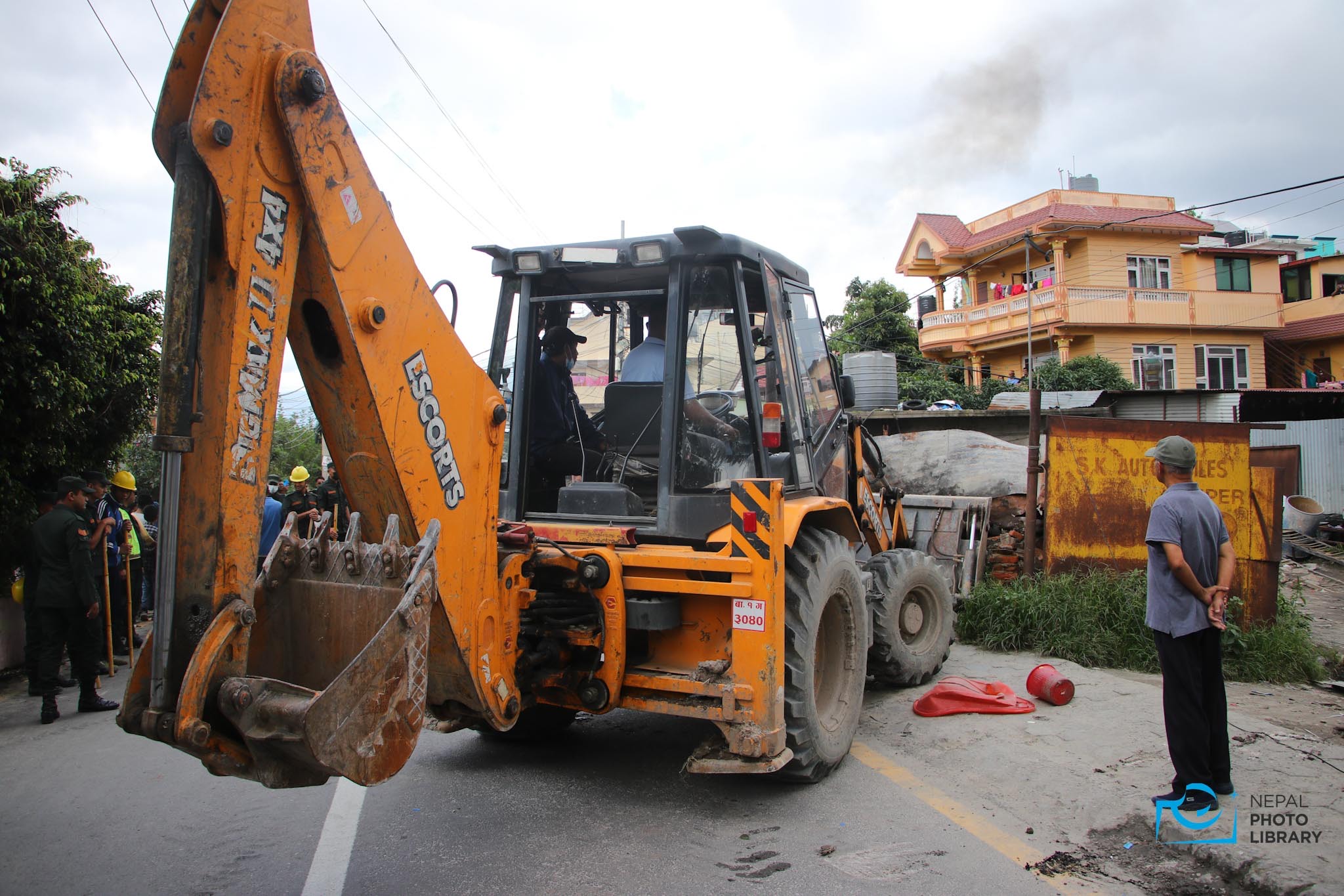 Unauthorized structures along Dhobi Khola demolished by KMC bulldozers (photos)