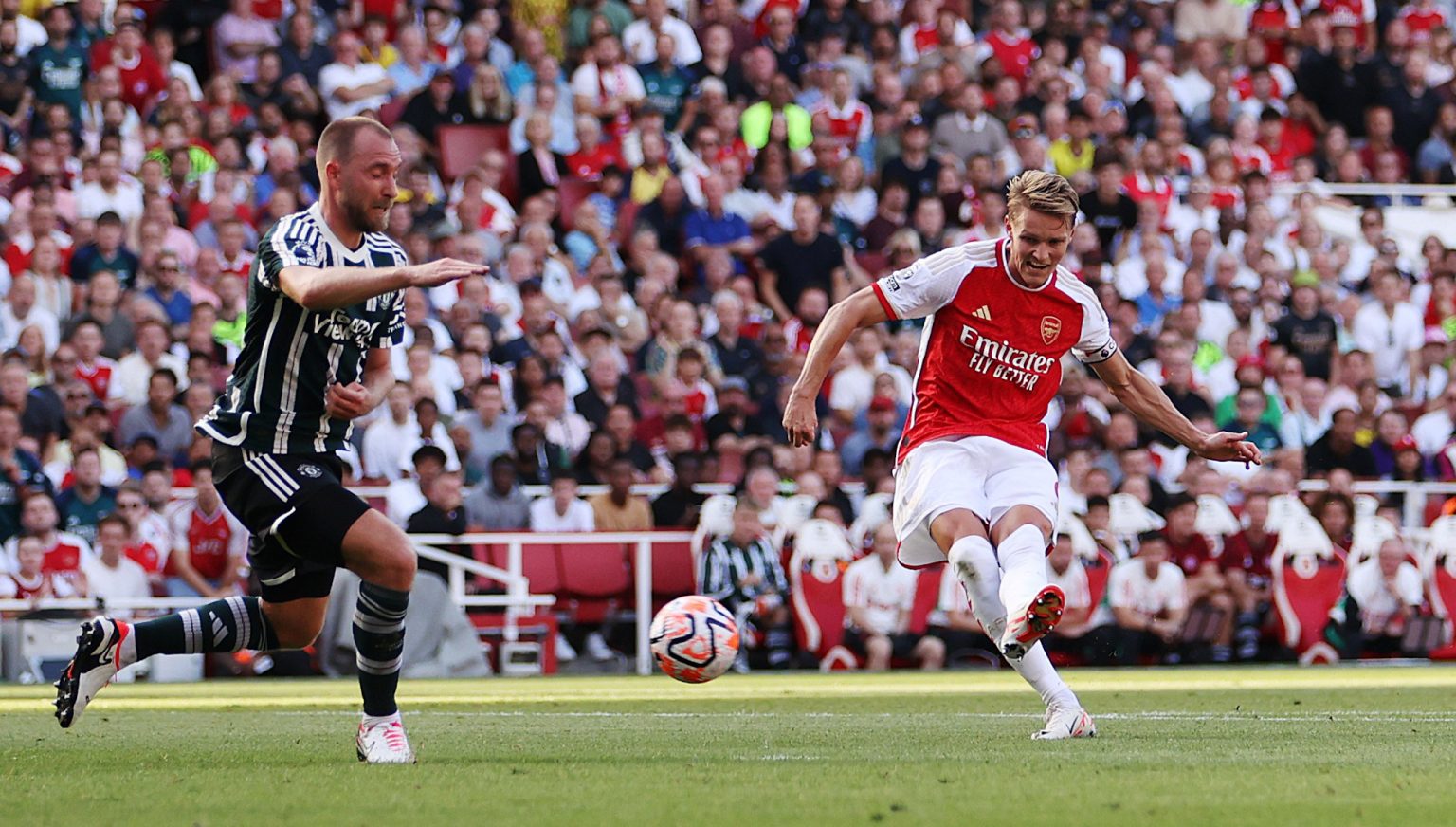 Late goals seal dramatic win for Arsenal