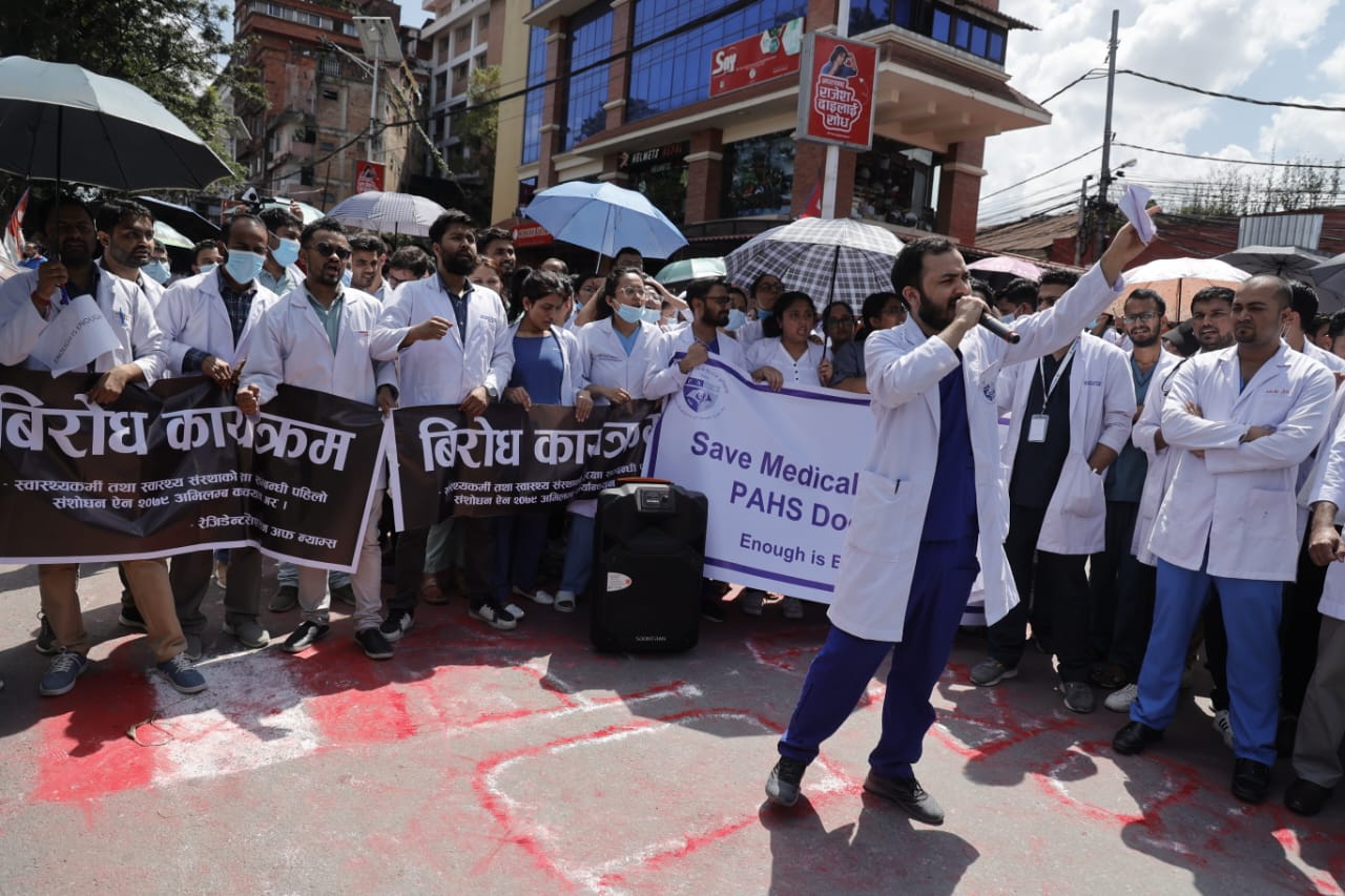 Doctors stage protest, call for resignation of Home & Health Minister