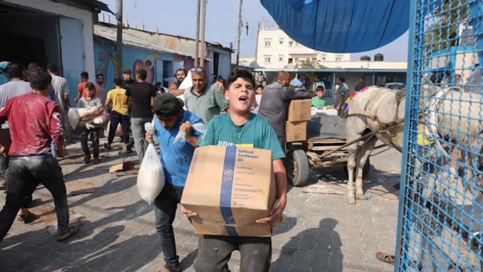 UN: Thousands in Gaza break into warehouses in search of aid