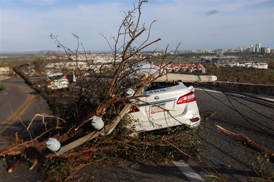 Hurricane Otis leaves at least 27 dead in southern Mexico