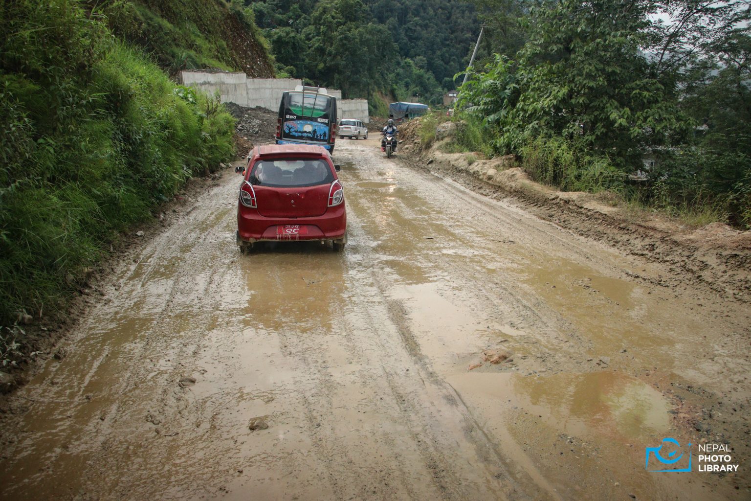 Prithvi Highway expansion causes Dashain travel woes: Dust & delays frustrate passengers (photos)