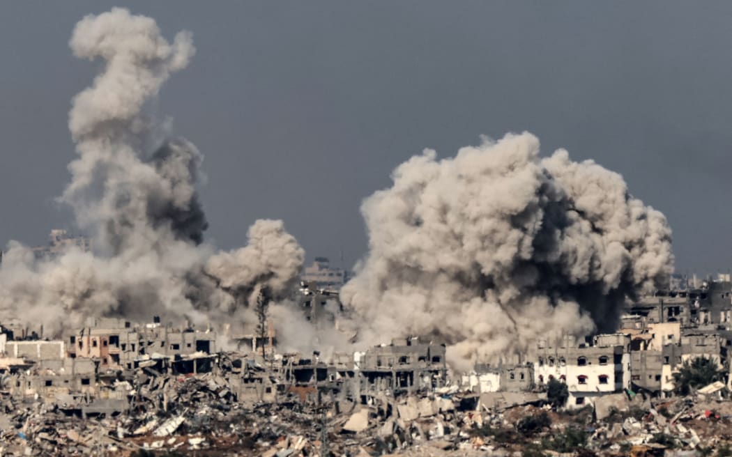 Israeli attacks on Gaza continue after UN adopts ceasefire resolution