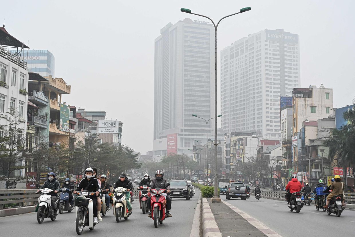 Hanoi chokes as Vietnam capital tops most polluted cities list ...