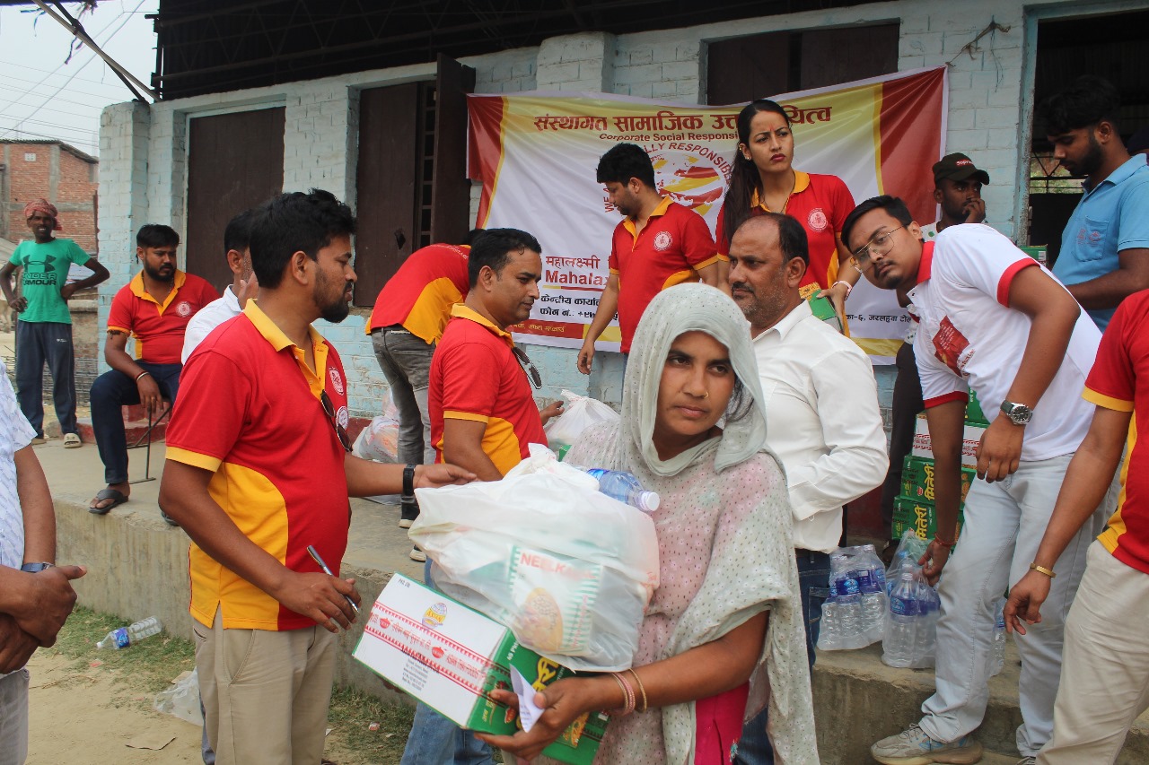 Mahalaxmi Bikas Bank provides relief materials to Mahottari fire victims