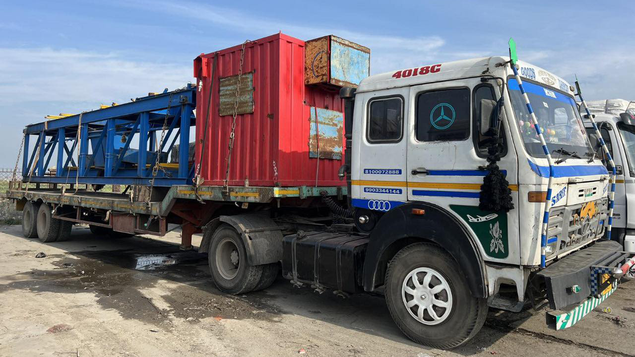 Truck carrying petroleum exploration equipment overturns on road