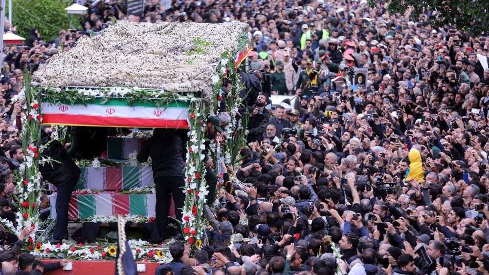 Iran’s supreme leader leads prayers at Raisi funeral