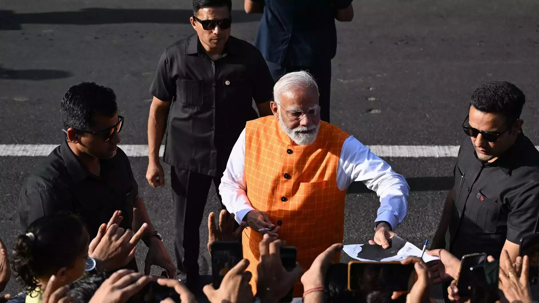 PM Modi votes as India’s marathon election heats up