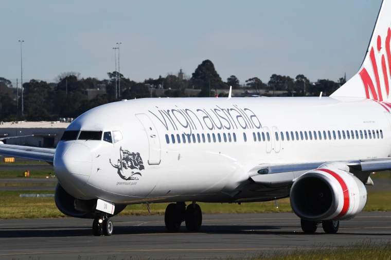 Passenger plane lands safely in New Zealand after a fire shuts down an engine