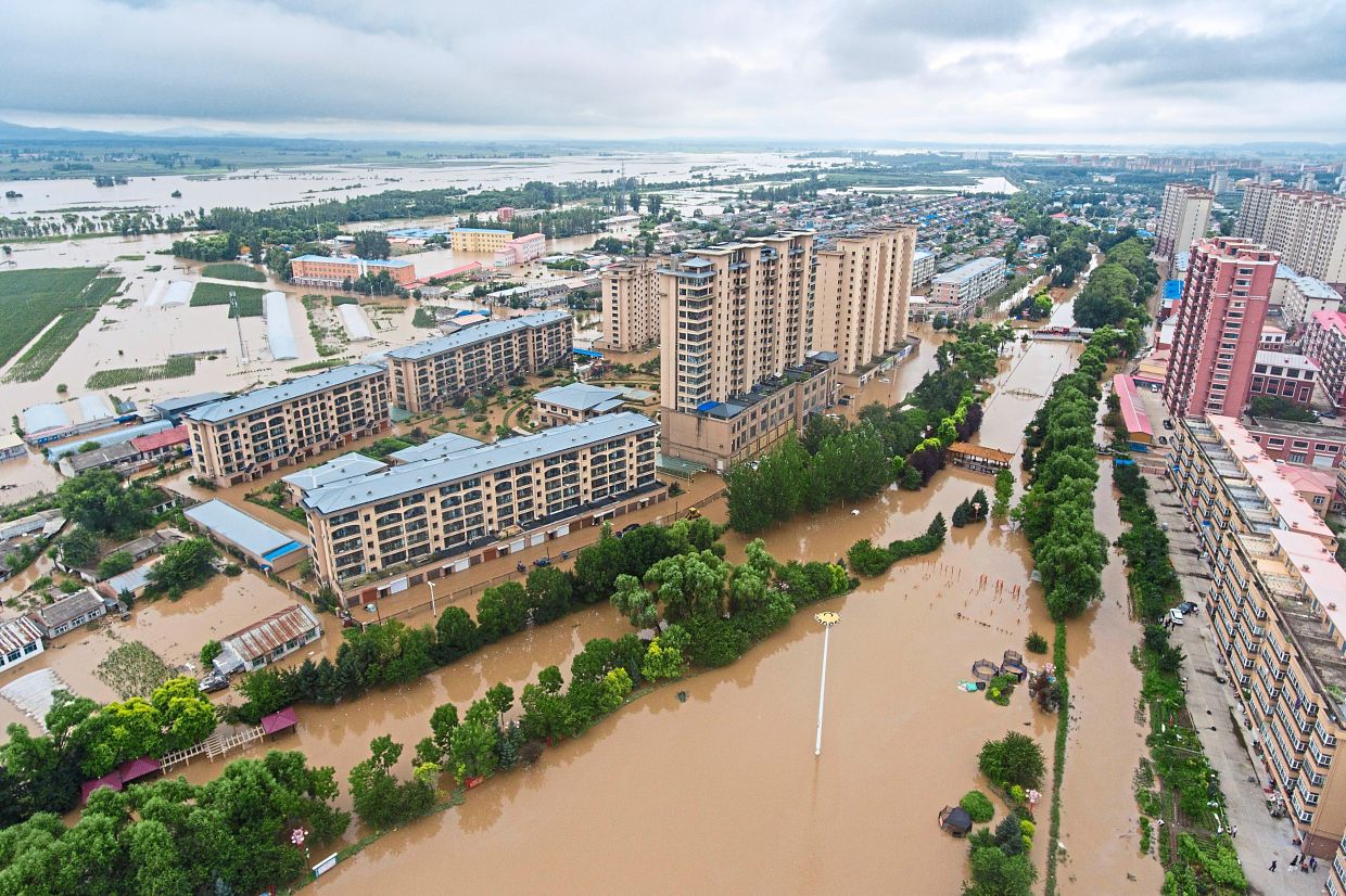 North China authorities warn heavy rains could spark floods, landslides