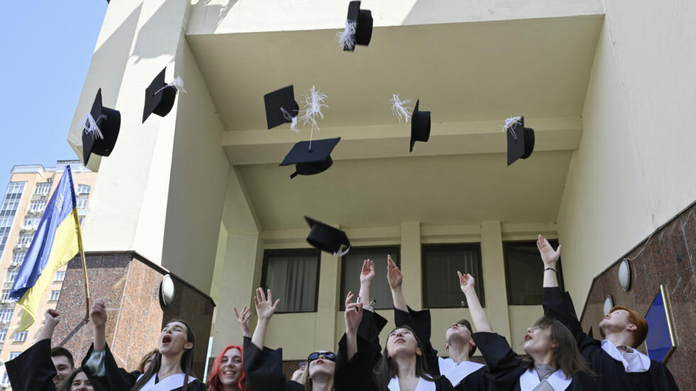 War, uncertainty push proud Ukraine graduates to ‘live now’